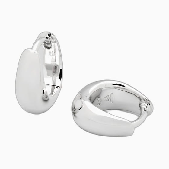 best jewelry brands tom wood ice huggie earrings - Luxe Digital