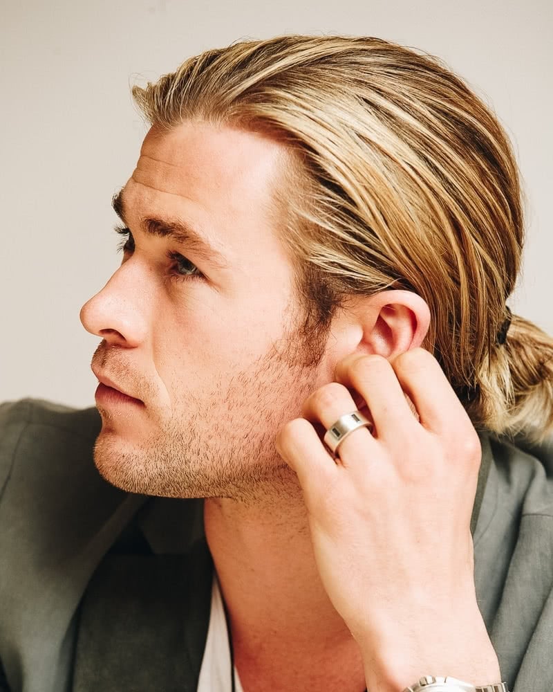 best long hairstyles men ponytail chris hemsworth - Luxe Digital