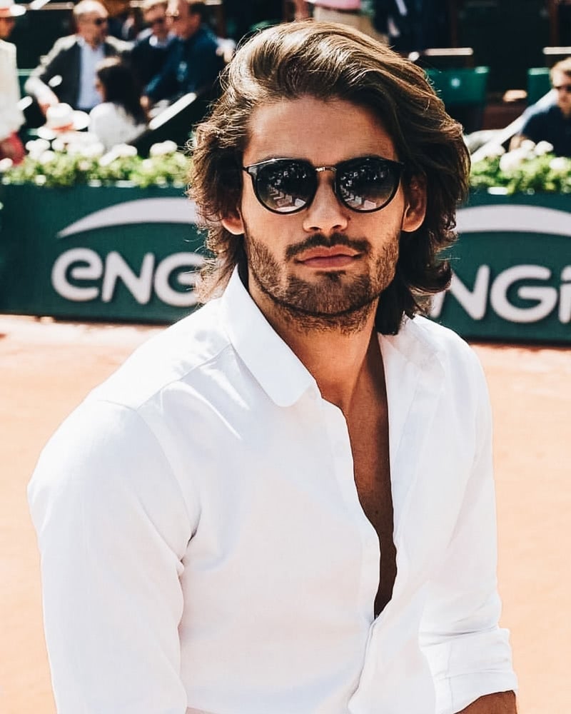 best medium length hairstyles men shoulder slicked back - Luxe Digital