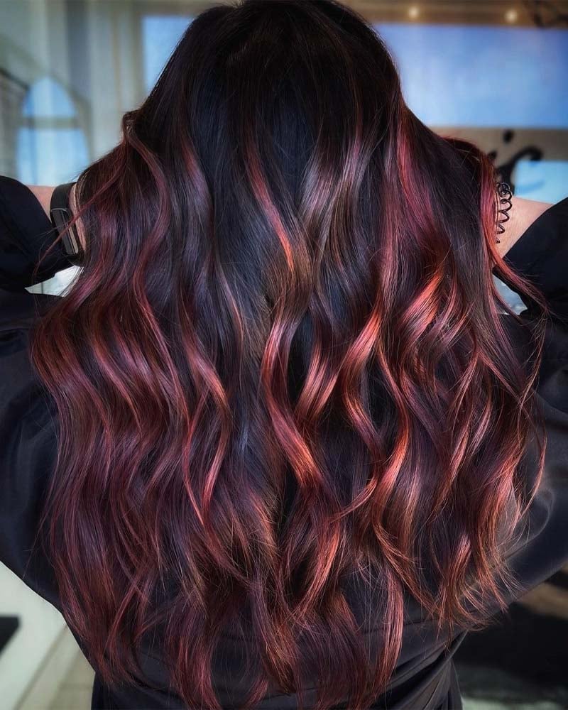 black hair with pastel red highlights - Luxe Digital