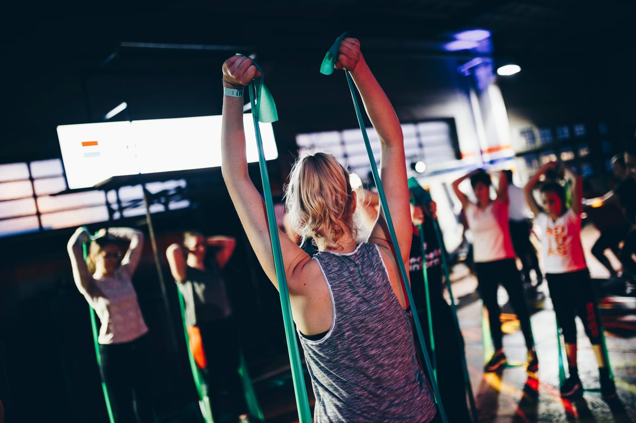 Group fitness class showing what an Equinox membership includes beyond equipment - Luxe Digital