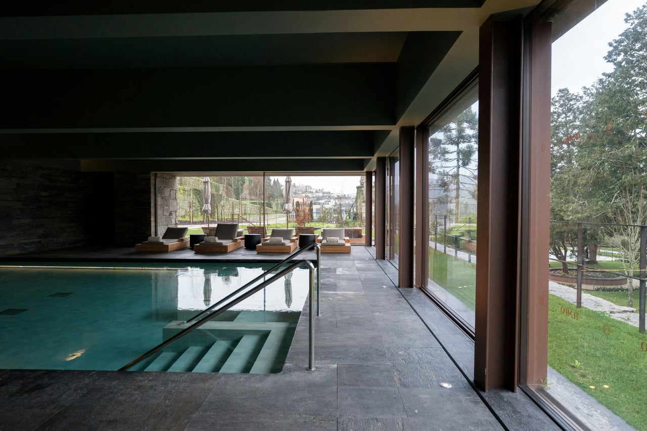 Luxury flagship gym pool illustrating Equinox's ultra-premium tiers - Luxe Digital