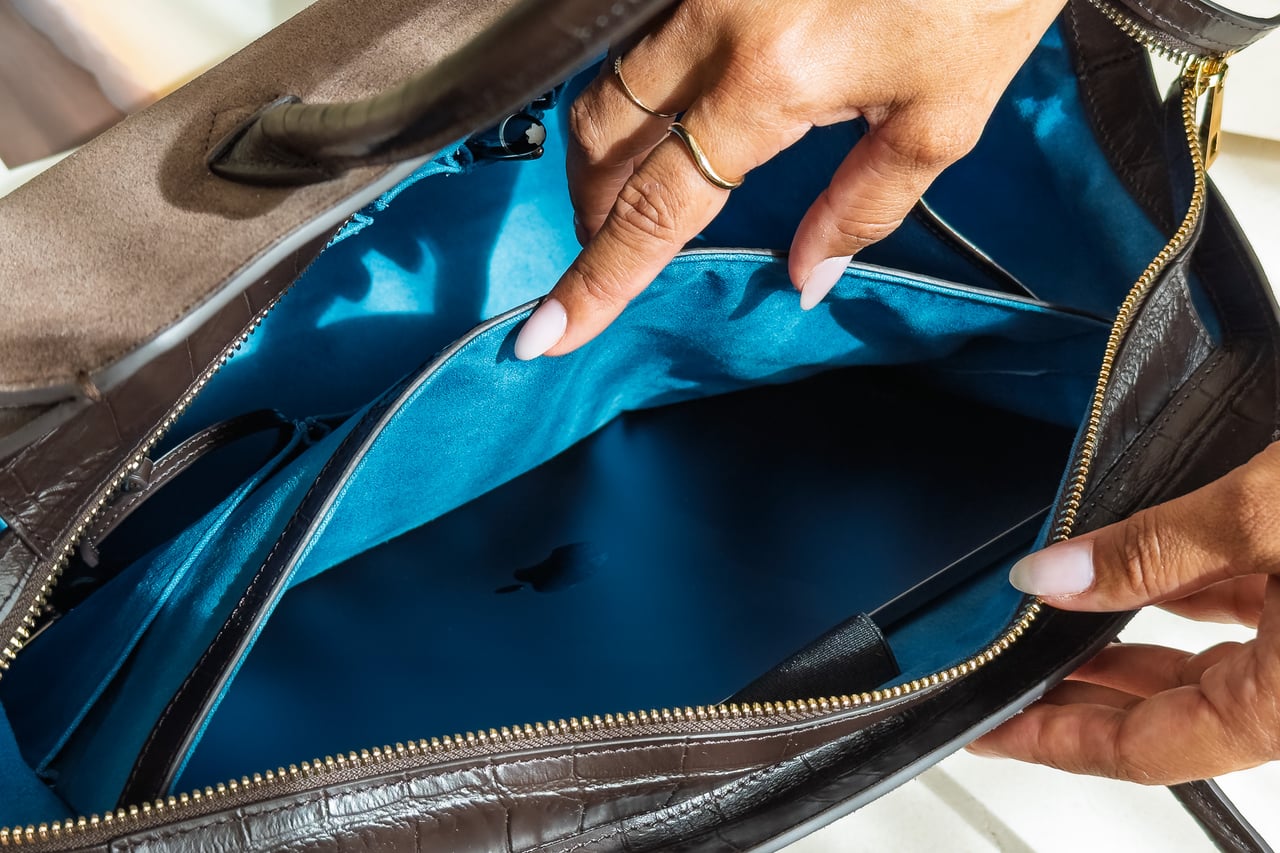 Padded laptop sleeve inside the blue-lined KAAI Voyager - Luxe Digital