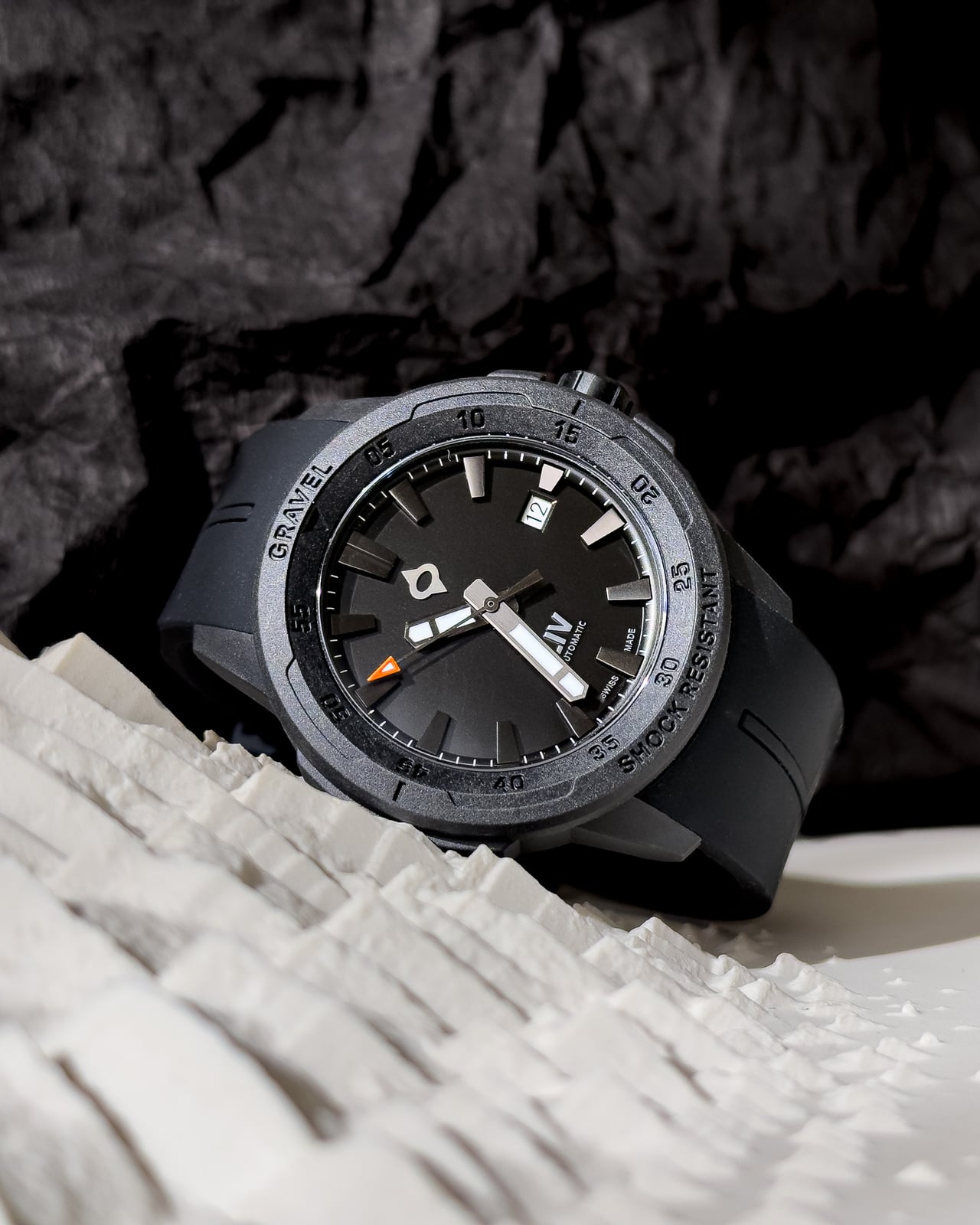 LIV Gravel Stealth Auto black dial design with floating claw indexes and date window - Luxe Digital