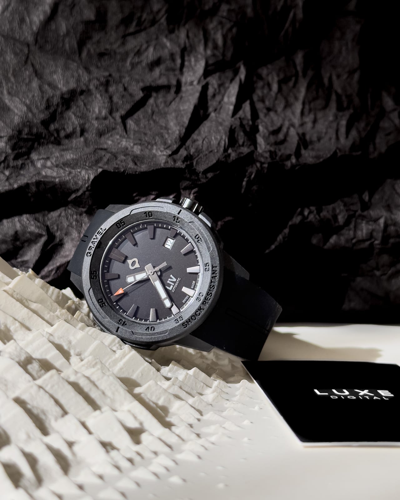 LIV Gravel Stealth Auto black carbon watch dial close-up - Luxe Digital