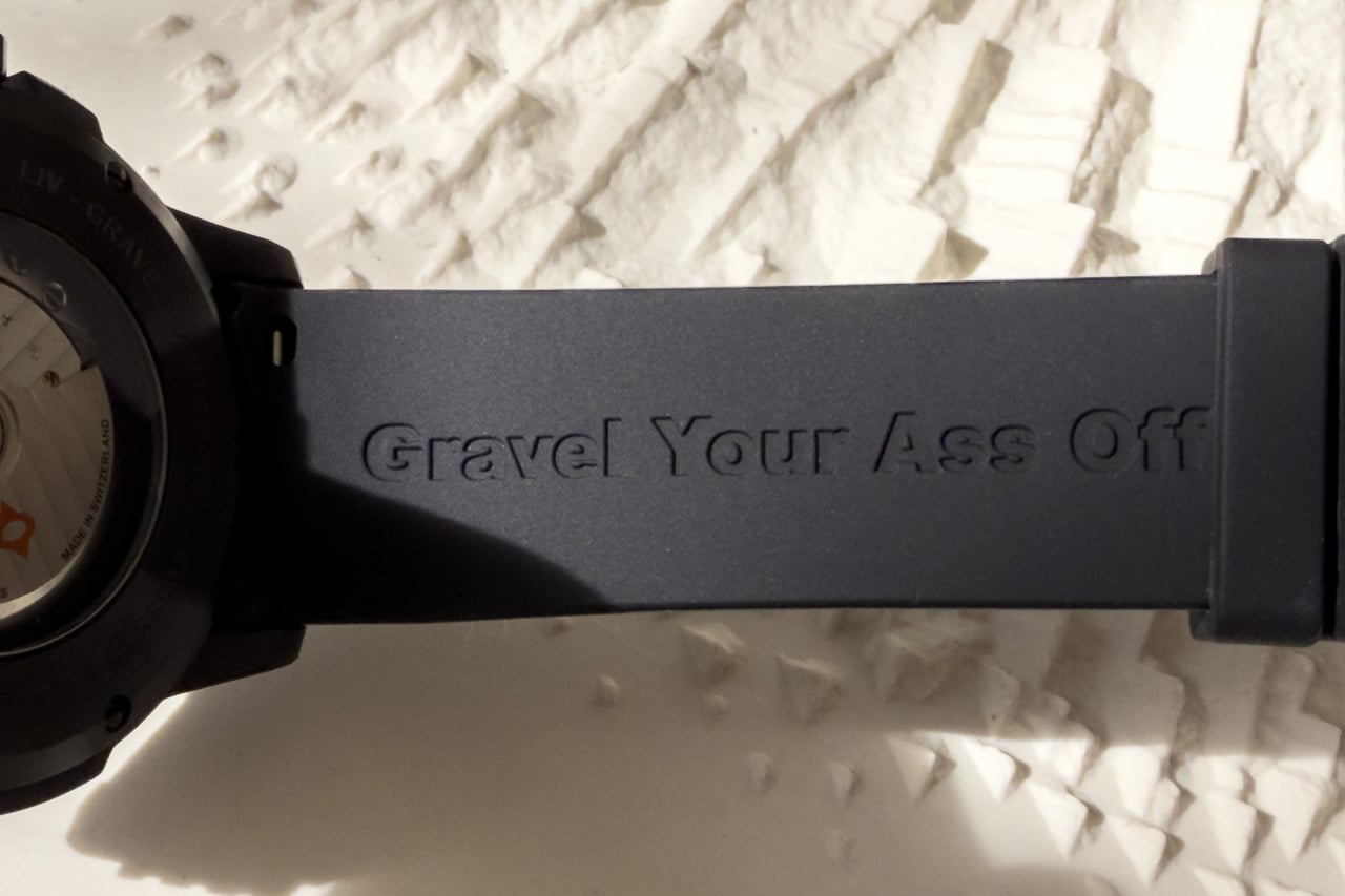 Gravel Your Ass Off engraving on the inside of the LIV Gravel rubber strap - Luxe Digital