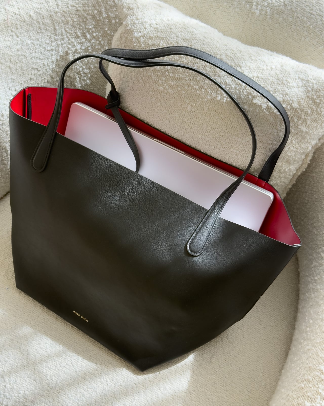 Laptop standing inside the open Mansur Gavriel Everyday Soft Tote - Luxe Digital
