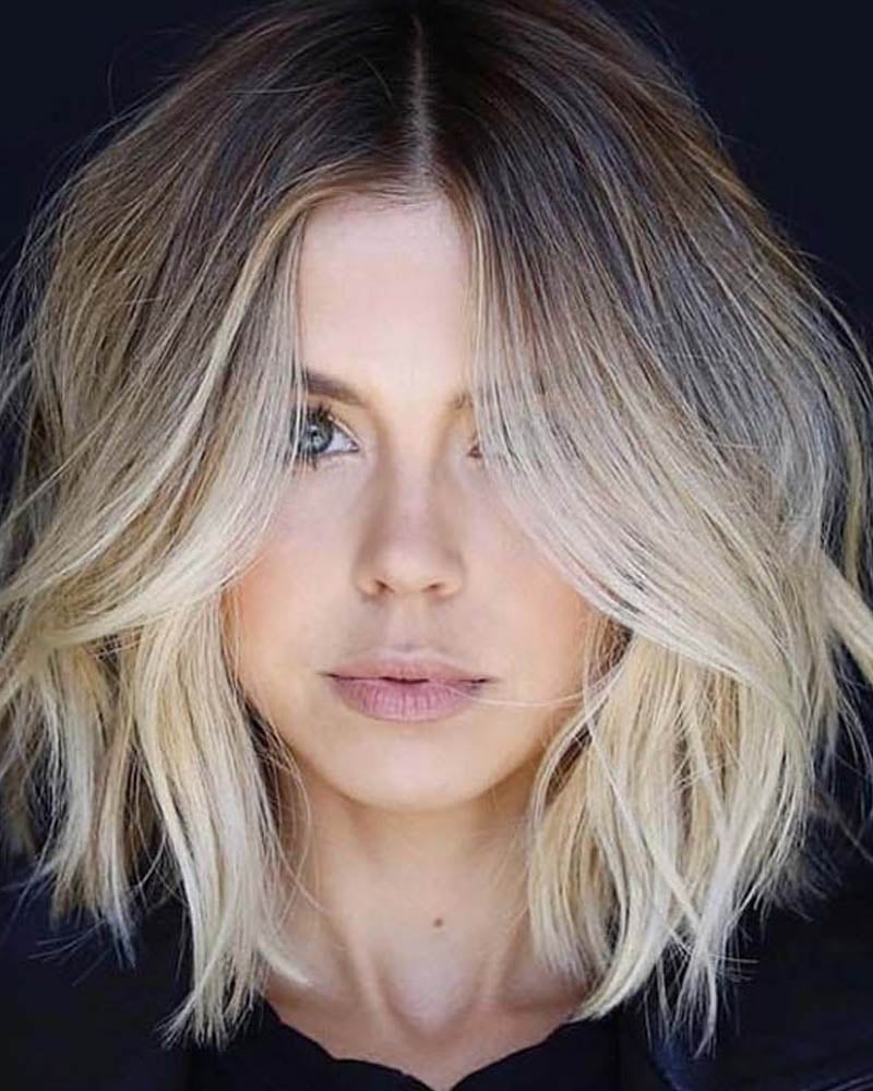 medium length hairstyles women blonde a line lob with face framing layers Luxe Digital