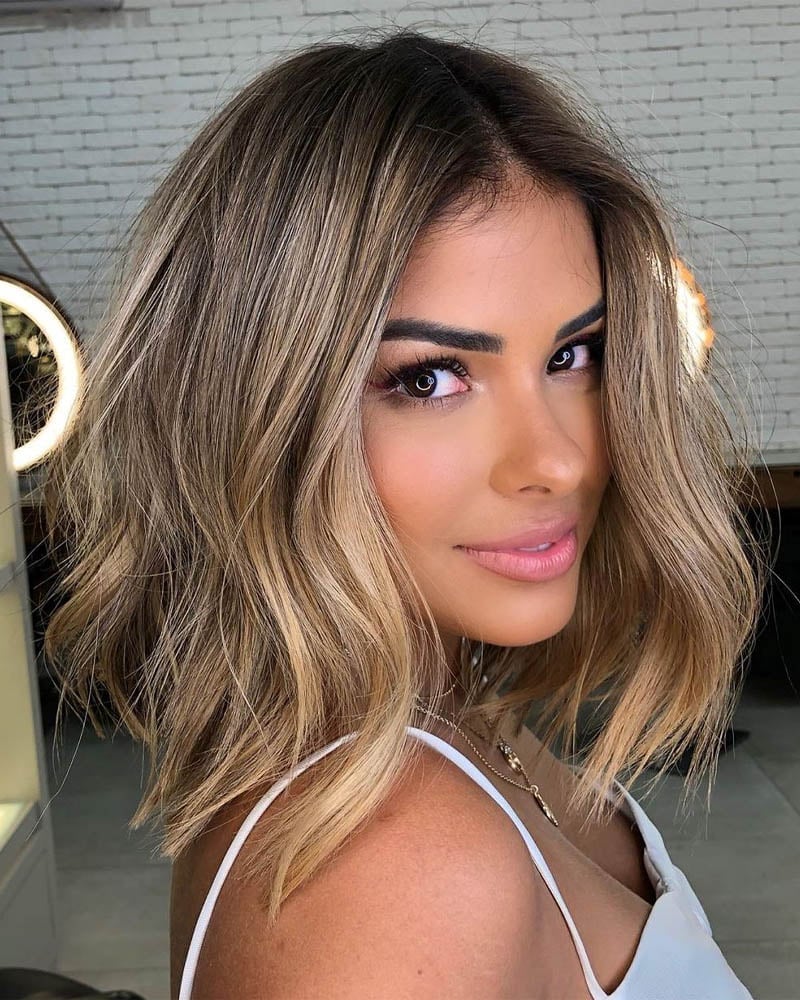 medium length hairstyles women long tousled lob with root fade Luxe Digital