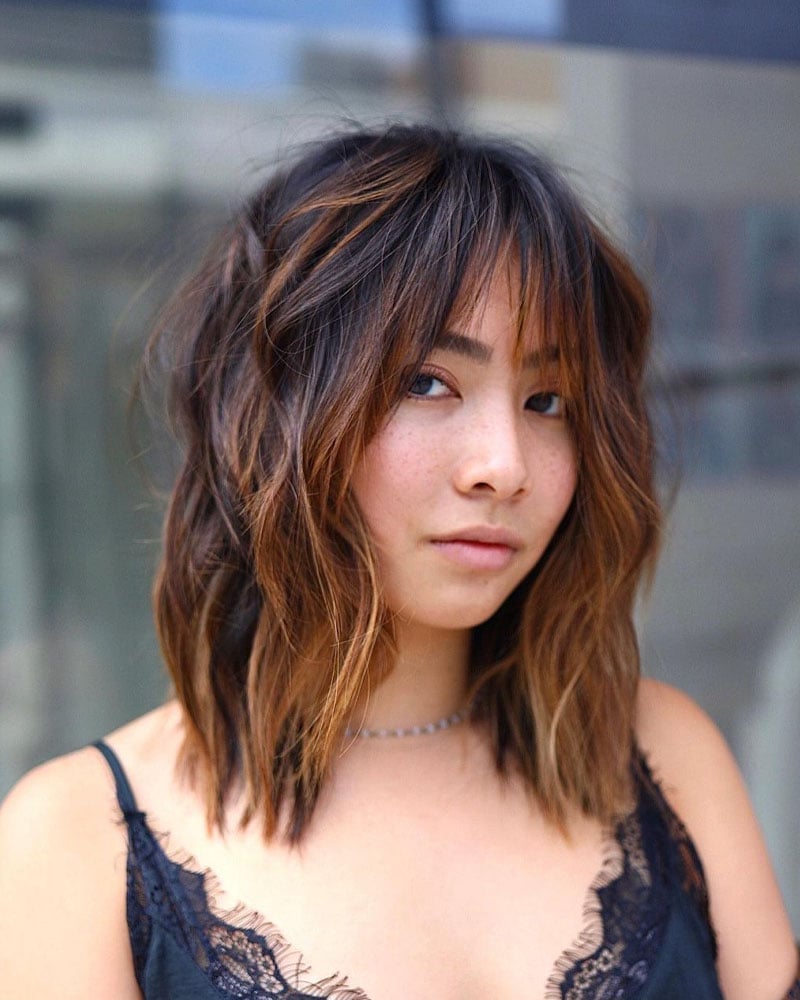 medium length hairstyles women wispy bangs with medium length hair Luxe Digital