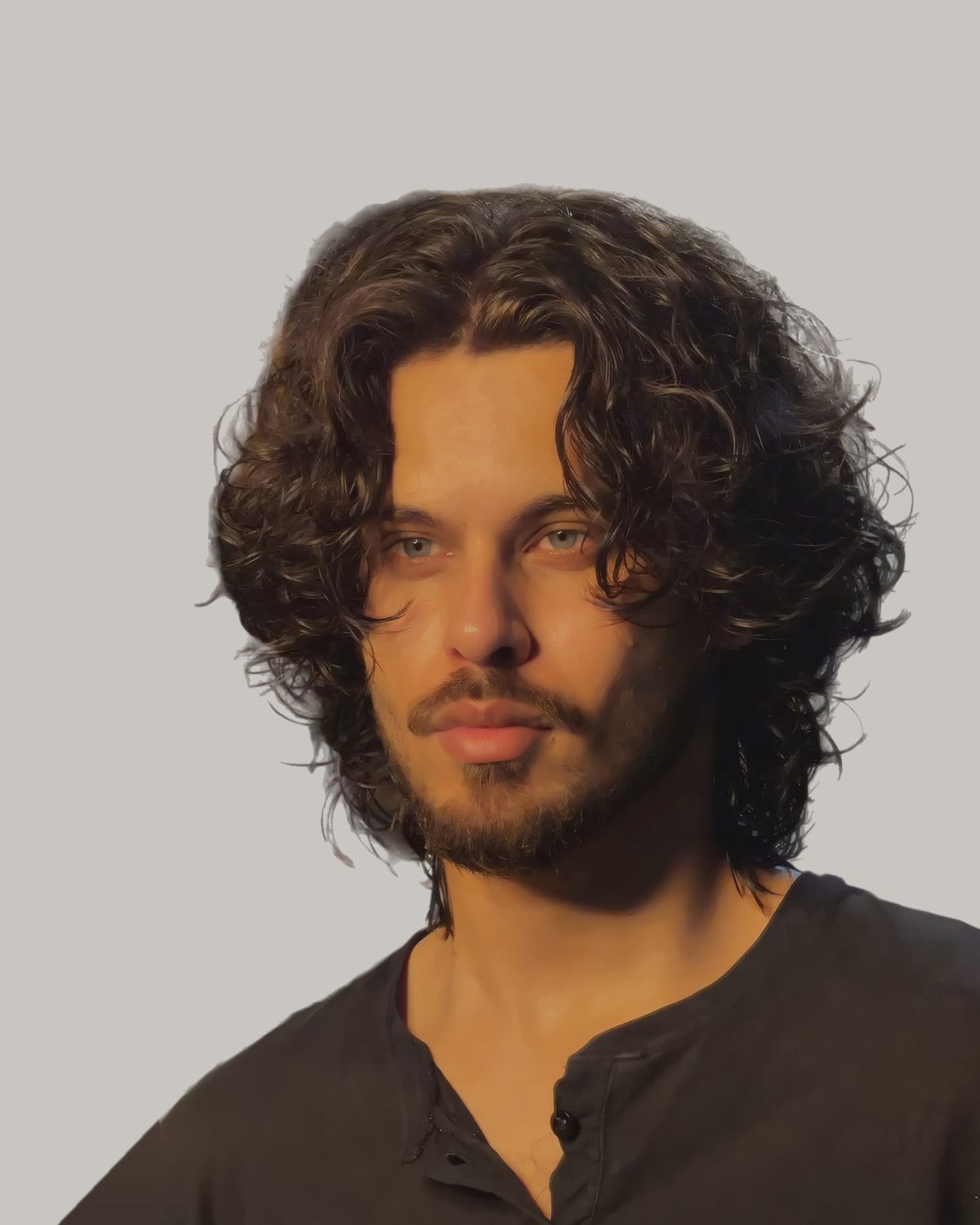 Bearded man with dark curls falling to his shoulders