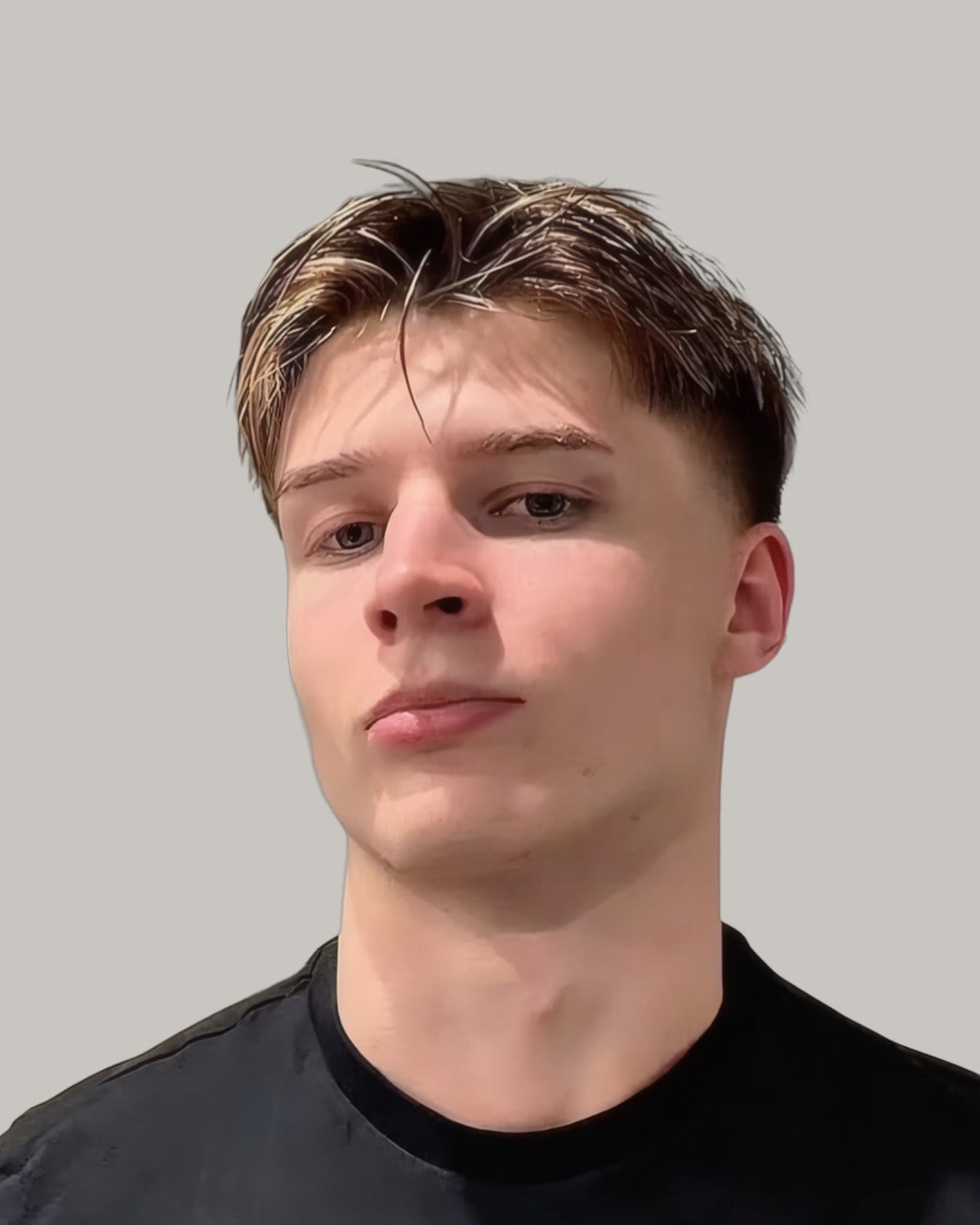 Young man with short brown hair combed over to one side, in a black T-shirt