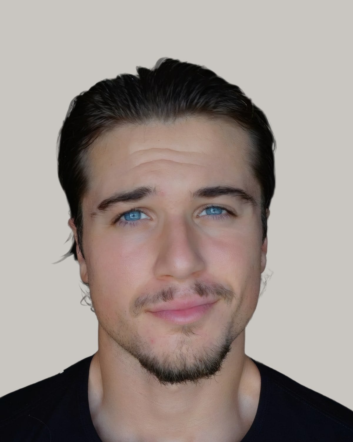 Man with dark hair swept back from the forehead, in a black henley