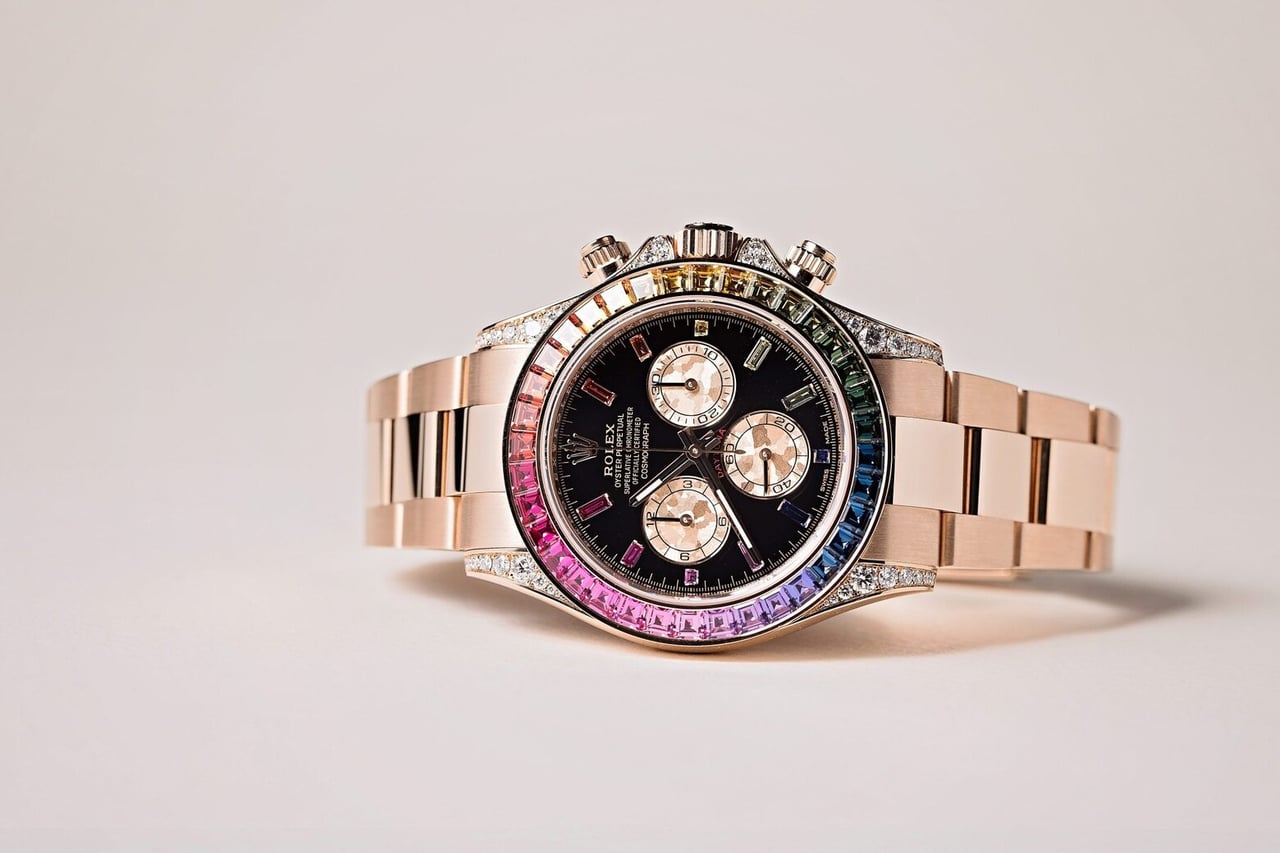 Rolex Rainbow Daytona in Everose gold with a rainbow sapphire bezel - Luxe Digital