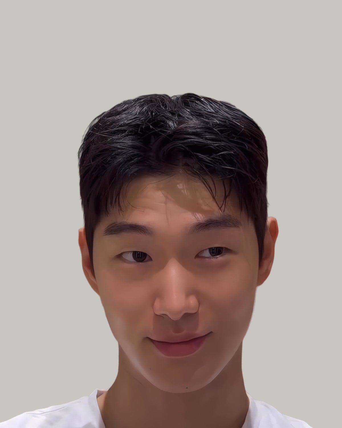 Smiling young man with a soft textured crop on straight hair, facing the camera