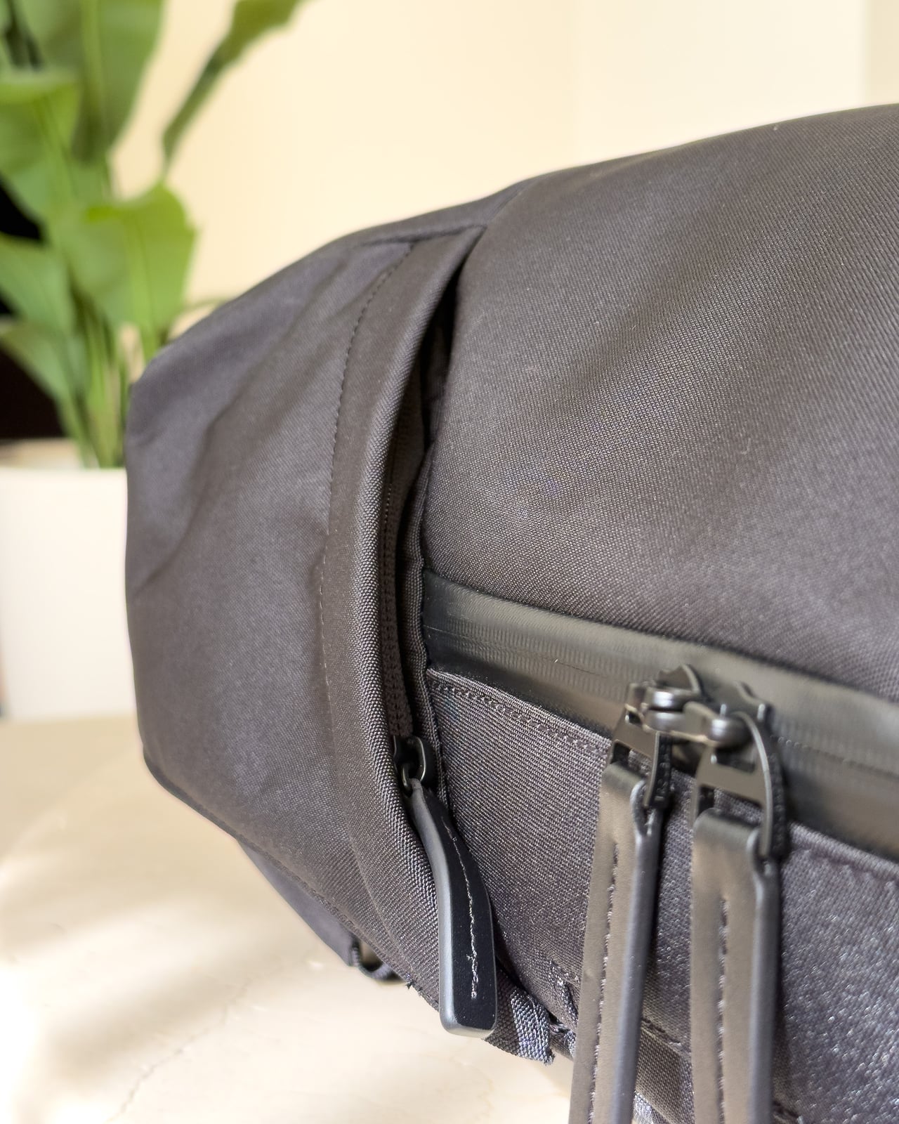 Side pocket and zipper detail on the Troubadour Apex Backpack 4.0 - Luxe Digital