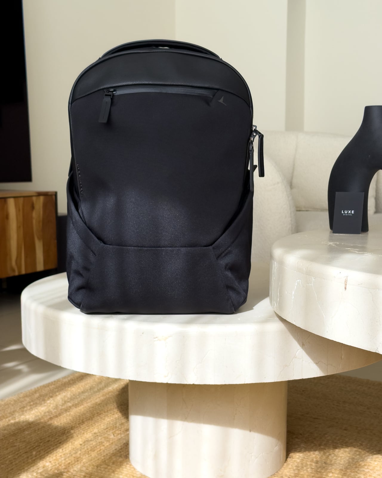 Troubadour Apex Backpack 4.0 shown from the front on a marble table - Luxe Digital