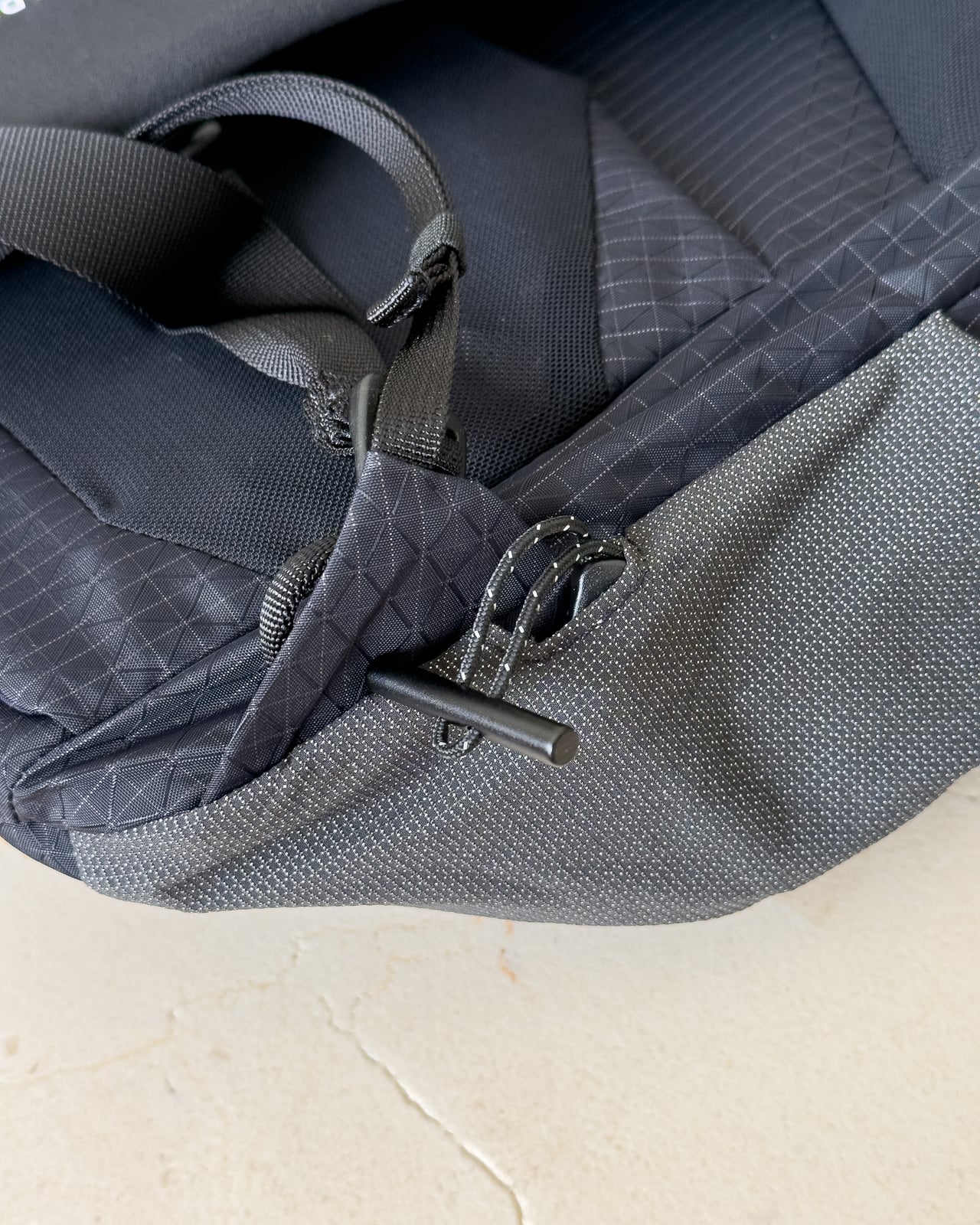 The side compression latches that keep the Elemental Backpack's profile lean - Luxe Digital