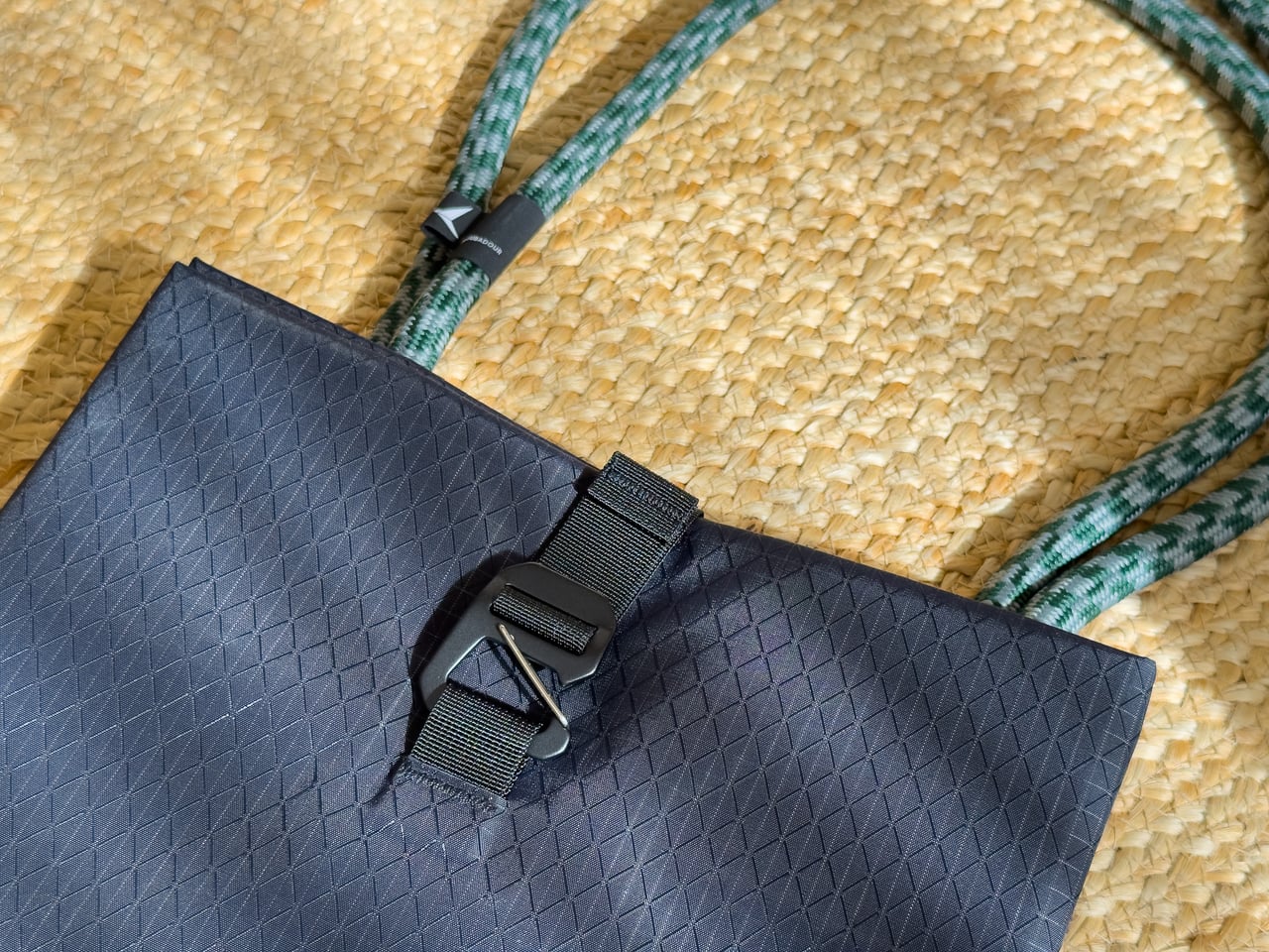 Close-up of the Gear Tote's gatekeeper clip and rope handle - Luxe Digital