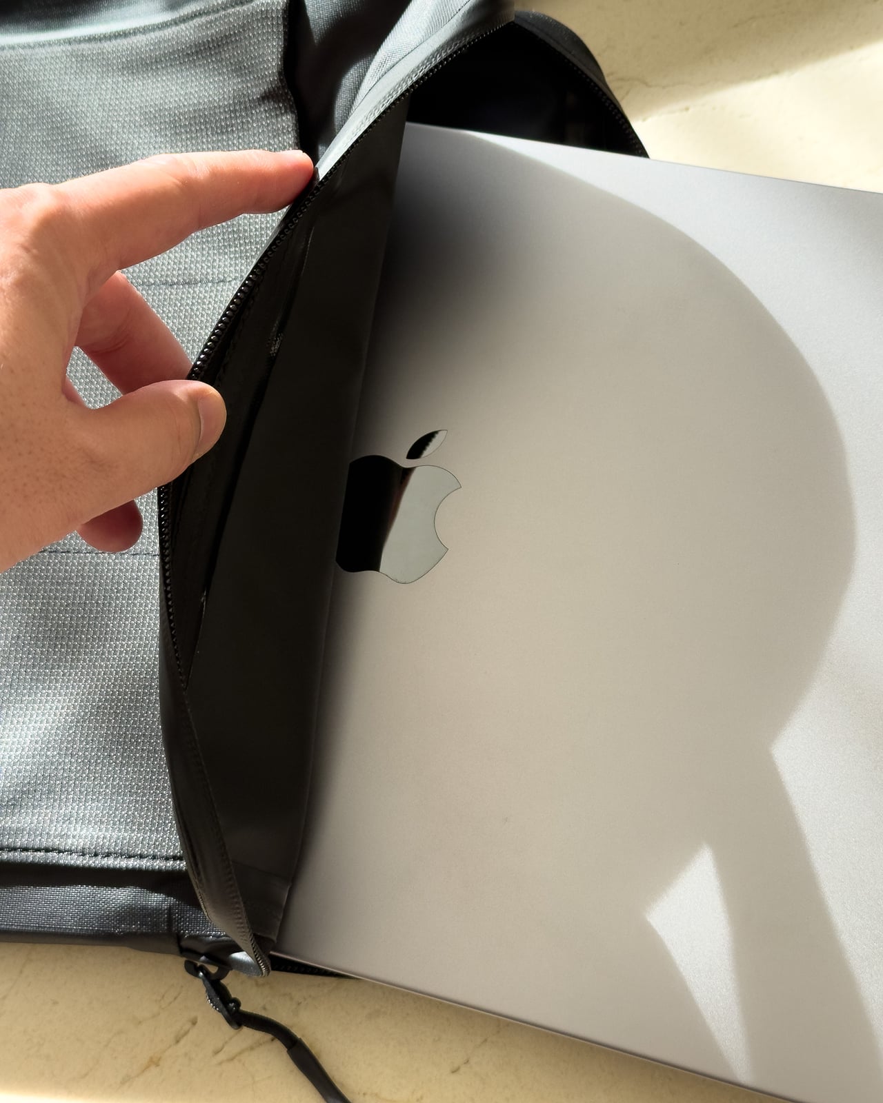Troubadour Elemental Backpack's DRYLINE COCOON laptop case fitting a 16-inch MacBook Pro - Luxe Digital