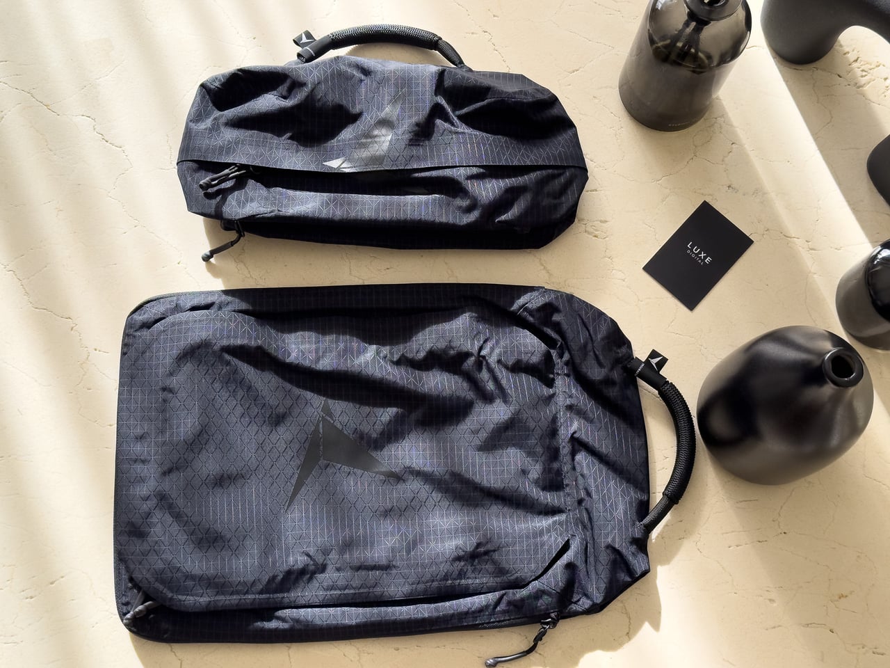 The Large and Small Packing Domes tested alongside the backpack - Luxe Digital