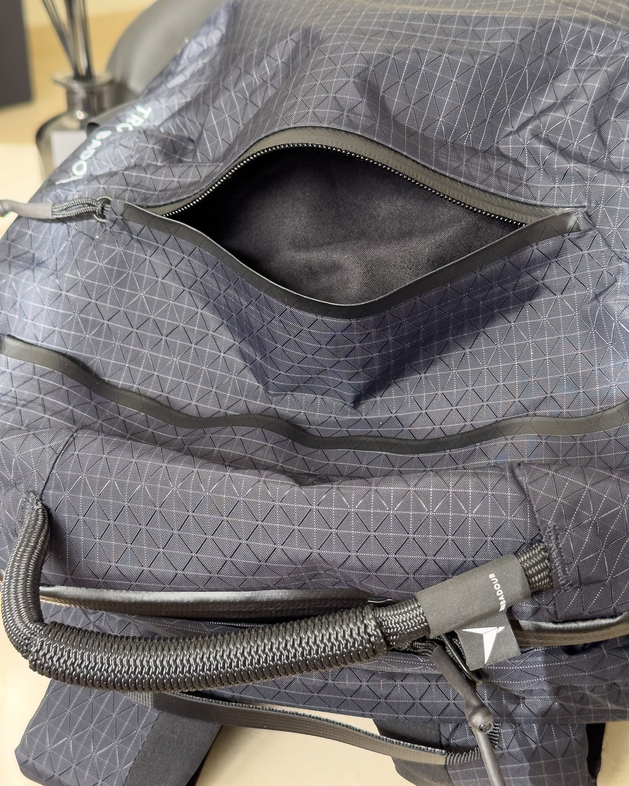 One of the Troubadour Elemental Backpack's smaller zip pockets - Luxe Digital