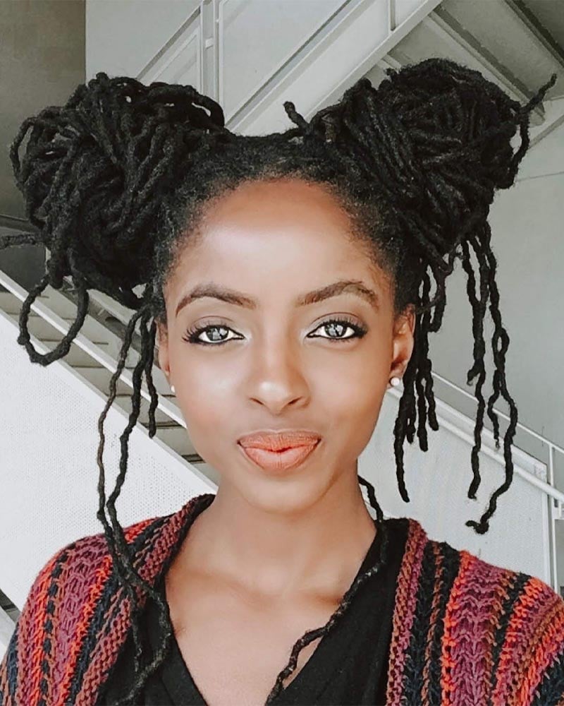women dreadlock hairstyles dreaded space buns - Luxe Digital