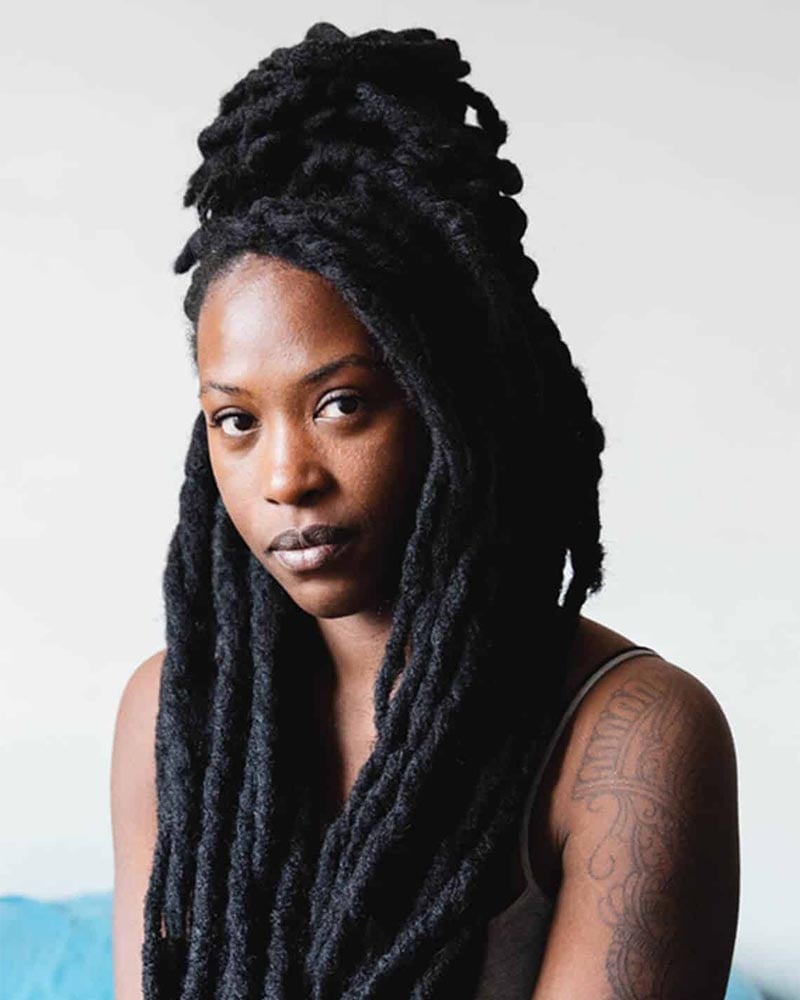 women dreadlock hairstyles half up half down dread bun - Luxe Digital