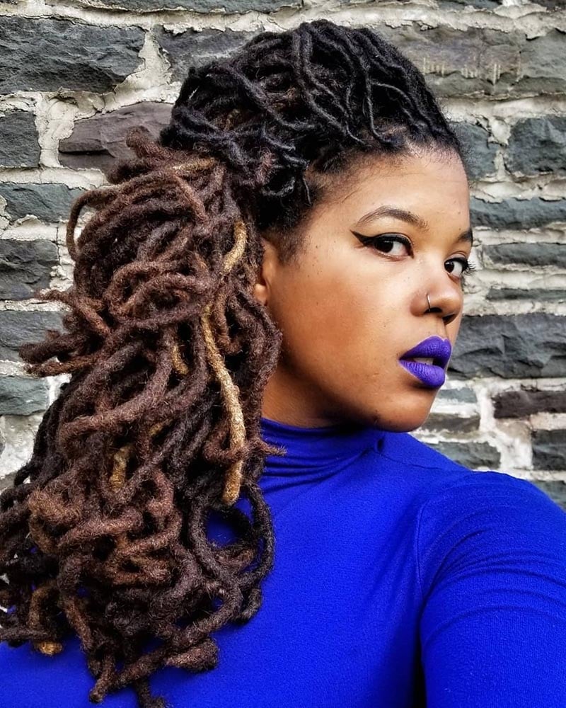 women dreadlock hairstyles side swept braided dreads - Luxe Digital